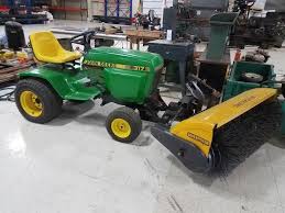 It is one of the hydrostatic lawn tractors produced by the deere and company. John Deere 317 With 4 Sweepster Broom Live And Online Auctions On Hibid Com