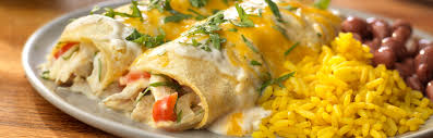 In a mixing bowl, combine the sour cream, heavy cream, and the remaining the salsa verde from dipping the tortillas. Enchiladas Suizas Prego Pasta Sauces