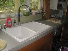 Neutral style vessel sinks, such as white porcelain or glass, can be paired with just about any faucet that is compatible with your sink's height. When Is A Gooseneck Faucet Too Ridiculously High