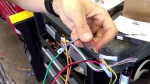 Using a 10mm socket, remove the 4 bolts holding the radio in place and remove the radio trim panel by gripping the sides and slowly pulling away. Pacific Accessory Corp Pac Tr7 Video In Motion Bypass Wiring For Alpine Navigation Head Unit Youtube
