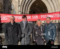 Left-right) Christopher Stonehouse, Pauline Stonehouse, Gillian Harding and  Gregory Harding outside the the Royal Courts of Justice, London. Former  subpostmasters Mr Harding and Mrs Stonehouse have been been cleared by the  Court