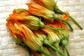 You can also eat the male blossoms or the female blossoms remaining on the ends of young zucchinis. Squash Blossoms Harvest To Table
