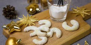 Place seam side down on parchment covered cookie sheet. Vanillekipferl The Austrian Crescent Shaped Biscuits