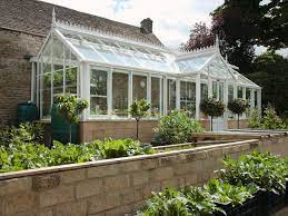 Traditional wooden greenhouse attached to side of house, english garden, england louth, lincolnshire, england, old victorian greenhouse. 3 4 Span Greenhouse Perfect Greenhouse For Less Than Perfect Sites