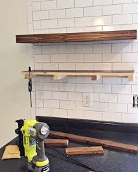 In addition, shelves can lay on a wall bracket or be floating shelves. Diy Kitchen Floating Shelves Lessons Learned Angela Marie Made