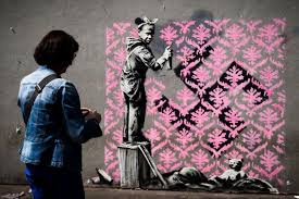 But that hasn't stopped him from selling art pieces for millions of dollars, compiling books of his work, and making documentary films about his escapades. Banksy Shakes Up Paris Elusive Graffiti Artist Produces Seven Works On Migrants Headscarves And Protests
