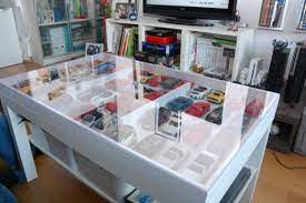 A distinctive choice for your living room. Coffee Table To Showcase Your Collector Cars In Style Homecrux