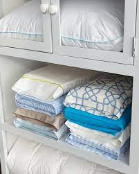 If your cabinet or closet has become unmanageable, it might be time to employ these storage and organizing hacks to remake this space into a if you are short on space in your cabinet, you'll need to be more choosey about what you store there. How To Keep Matching Sheets Together In The Closet Martha Stewart