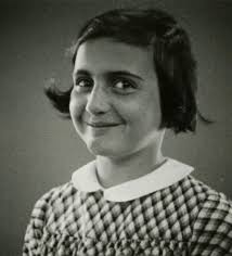 MAY 1927: One-year-old Margot Frank sits