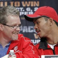 Freddie Roach takes hard punch