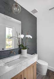 Powder Room Features A Brick Accent Wall Painted In Farrow And Ball Downpipe 26 And Slab Stone Sink Far Powder Room Decor Modern Powder Rooms Powder Room Small