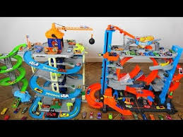 Super Epic Hot Wheels City Ultimate Garage Vs Adventure Force Ultimate Dino City Garage Youtube Ultimate Garage Hot Wheels Dinos