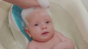 Place one hand under the baby's bottom. Baby Bath Stock Video Footage Royalty Free Baby Bath Videos Page 4