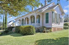 A Pink Victorian Cottage And More Houses For Sale Victorian Cottage House House Styles