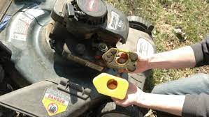 Remove the air filter from the mower by undoing the flat head screw. How To Clean Lawn Mower Paper Air Filter Expert Advice Upd 2021
