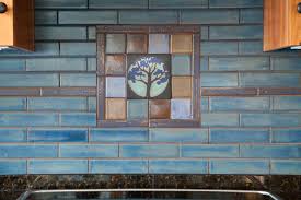arts & crafts tile mural behind stove