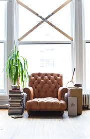Beautiful Reading Space It Looks Like A Throne Love The Stack Of Books To Display A Cool Plant The Skis On The Win Home Decor Interior Leather Accent Chair