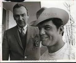 1969 Press Photo Joe Eason Gives Hat to Houston Football Player Jim Strong