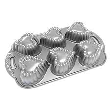 Our unique cast aluminum bundt bakeware pans provide fine details and superior baking performance. Nordic Ware Elegant Heart Cakelet Pan Metallic Buy Online In Angola At Angola Desertcart Com Productid 28679223