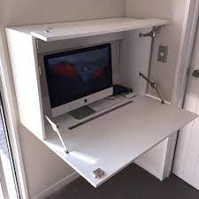 When not in use, the desk surface slides flush with the top, and when open, it creates a 31.5″w x 23.5″d desktop, with a space for for accessories and office supplies. Pin On Desks