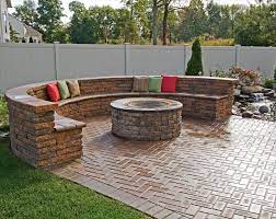 Portable and easy to store: Love The Outdoor Fire Pit With The Stone Sitting Bench Backyard Fire Fire Pit Backyard Fire Pit Seating