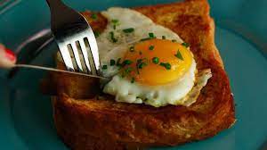 Bacon Tomato Stuffed French Toast Topped With Fried Eggs Anne Burrell Recipe Chef Anne Burrell Toast Toppings Brunch Recipes