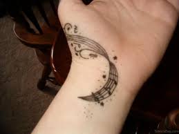 Superb music note tattoo on wrist. 70 Classic Wrist Tattoos
