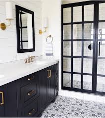 Black And White Cement Tile Bathroom Floor Black And White Bathroom Beauty With Cement Tile Steel Frame Shower Door And Brass Details Sit White Master Bathroom Bathroom Inspiration Black Shower Doors