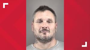 Man charged with murder after turning himself in