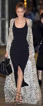 Who Made Gigi Hadid S Black Dress Leopard Coat Handbag Jewelry And Sandals Nice Dresses Fashion Gigi Hadid Street Style