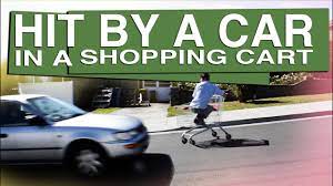 An image of a shopping cart damaging a car. Getting Hit By A Car In A Shopping Cart Youtube