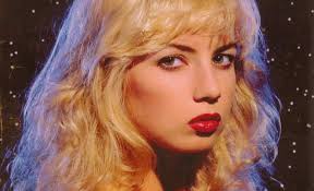 An alien arrives on earth looking to take human blood in an attempt to preserve his dying planet. Not Of This Earth Traci Lords Promotional
