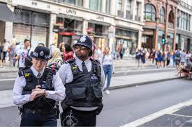 Check spelling or type a new query. London Uk July 2019 Two British Police Officers Patrolling Stock Photo Picture And Royalty Free Image Image 136012133