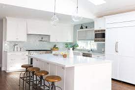 I would have shared the remodel earlier with you but my computer crashed and i lost all the photos on my computer of the remodel! White Shaker Kitchen Cabinets With Blue Glazed Subway Tile Backsplash Transitional Kitchen