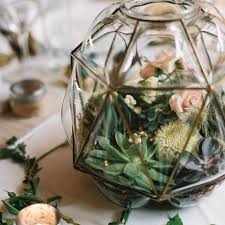 Closed terrarium from glass centerpiece. 19 Terrarium Centerpieces For The Seriously Cool Couple