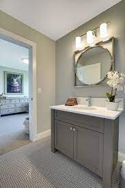 Bathroom decorating and design ideas. A Lot Of Experts Recommend Grey Colors For The Walls Floors And Furniture Of The Bat Grey Bathroom Cabinets Bathroom Color Schemes Painting Bathroom Cabinets