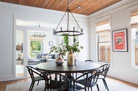 Transitional in style to go with almost any home's. Rustic Black And White Dining Room With Black Chandelier Hgtv