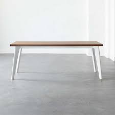 Measuring 55.1'' l x 31.5'' w x 29.75'' h, this piece comfortably seats up to four people. White Dining Tables Cb2
