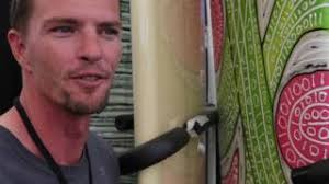 Kevin Connelly at The 2010 Sacred Craft Show in San Diego and his surfboards