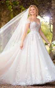 Lace illusion bodice gown with english net skirt and scoop back. Romantic Ballgown With Off The Shoulder Cap Sleeves Essense Of Australia Wedding Dresses