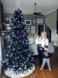 Decorating the christmas tree embodies the warming spirit of the holidays. Family By Black Christmas Tree Covet By Tricia
