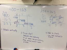 subtraction with vertical form and chips and place value