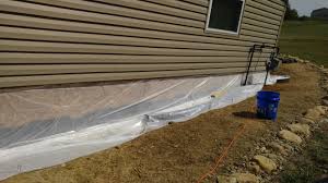 Mobile Home Skirting Framed And Sheethed And Undercoated With Plastic Sheeting To Prevent Rot Cabanon
