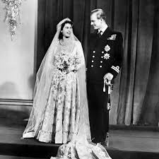 The gradually aggravating health of her father and the unfavorable forecasts of the doctors required the almost constant presence of the future queen during elizabeth ii and prince philip at the wedding of prince harry and meghan markle. The Queen S Wedding Dress Was Created Using Wartime Ration Coupons Tatler