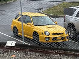 Image result for Herald Yellow 1975 Subaru