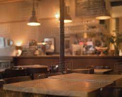 Set on dinning tables at cafe or restaurant. Tables In Empty Cafe Stock Photo Dissolve