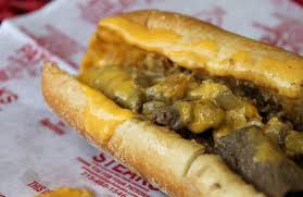 Place several slices of the meat on the bottom half of the roll, spoon some of the cheese sauce over. What S The Best Meat To Use In A Philly Cheese Steak