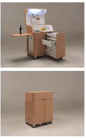 Antique, turn of the century enamel top kitchen work table with wheels. Kenchikukagu Mobile Furniture Kitchen Cart But Modify It As A Computer Workstation What Furniture For Small Spaces Space Saving Furniture Modular Furniture