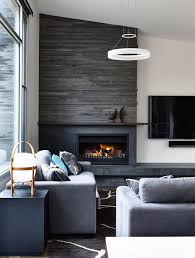 Continue to 2 of 22 below. Fireplace In Solid Colorblock Column With Two Textures Smooth At The Bottom Something Like Stacked Stone Above Living Room With Fireplace Home Fireplace Fireplace Design