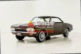 Image result for Sierra Tan 1965 Corvair